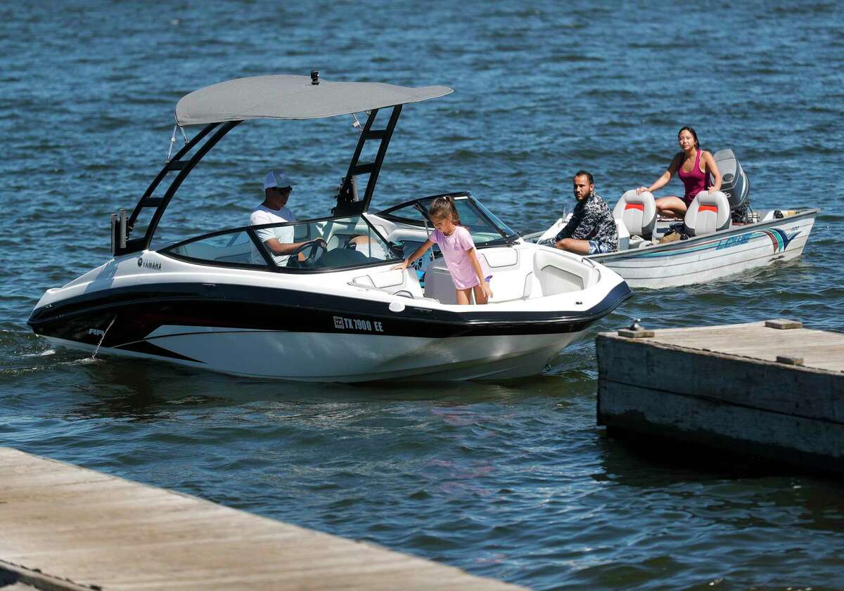 Boaters enjoy time on a busy Lake Conroe ahead of Memorial Day weekend, Thursday, May 26, 2022, in Conroe.