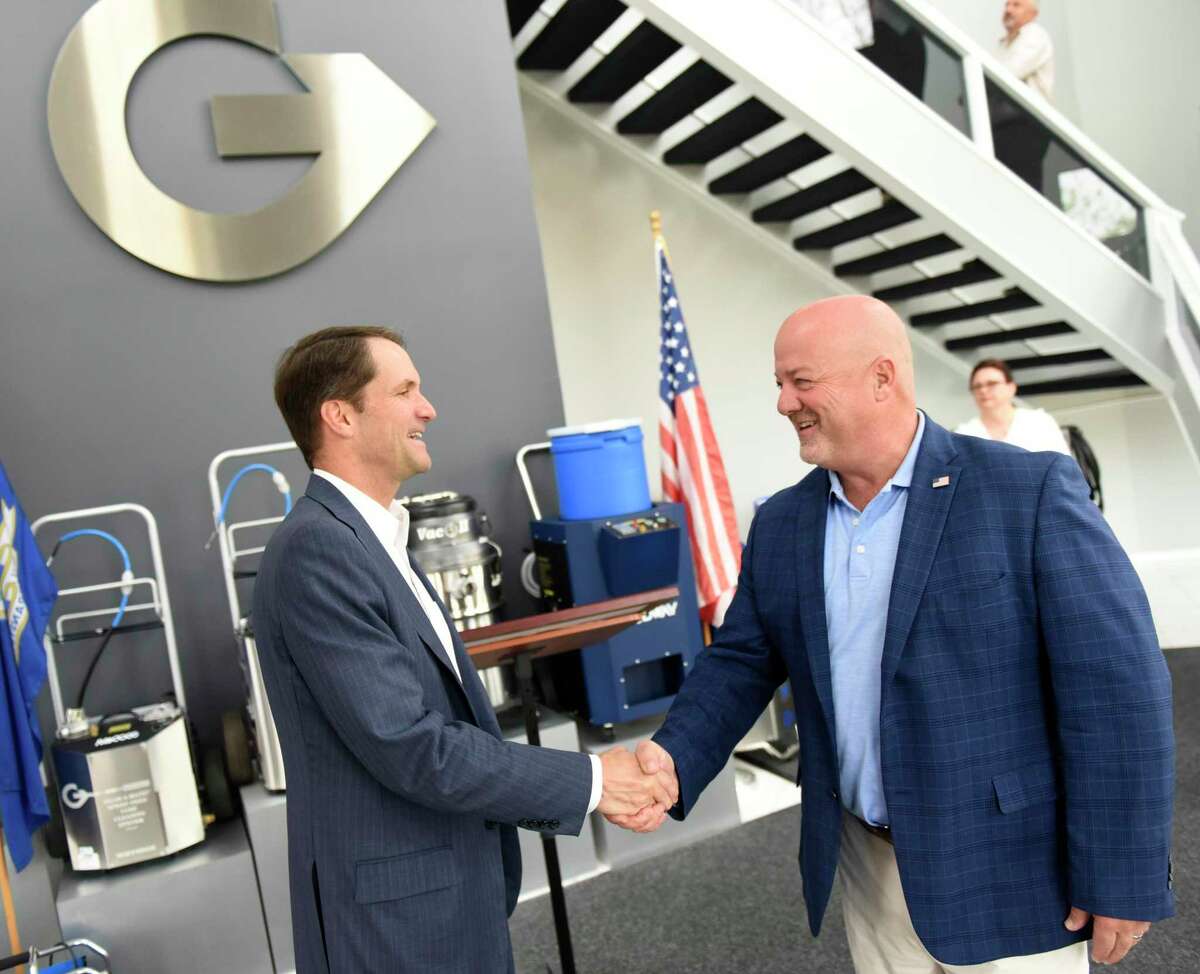 U.S. Rep. Jim Himes, D-Conn., left, greets Goodway Technologies CEO Tim Kane at the Goodway Technologies headquarters in Stamford, Conn. Tuesday, May 24, 2022. Goodway was recently recognized by the Small Business Administration as an Exporter of the Year, and Congressman Himes stopped by Tuesday to congratulate the staff. Goodway participated in the SBA's STEP grant program and the Paycheck Protection Program.