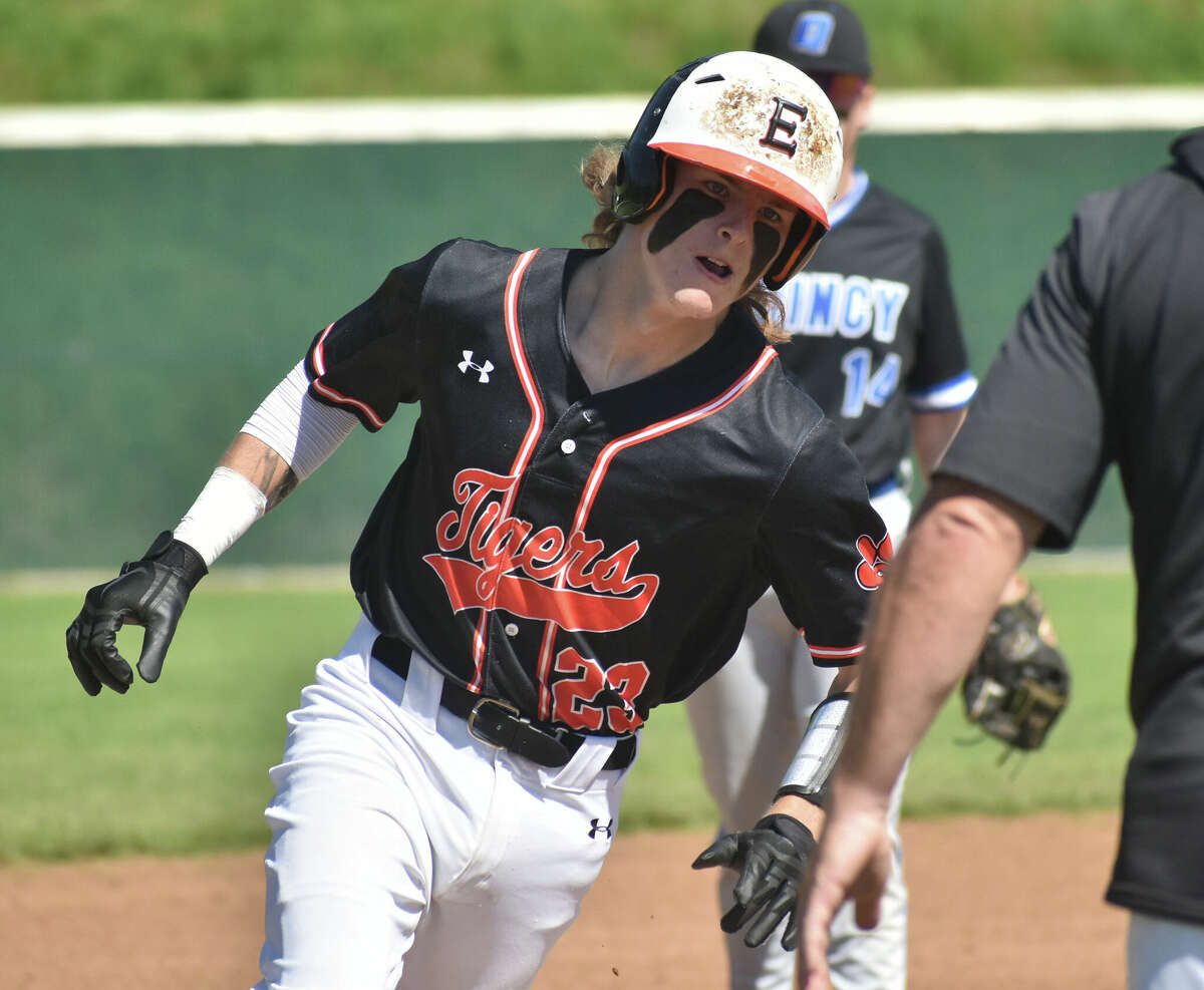 Edwardsville's Grant Huebner rounds third after homering against Quincy during the Class 4A Alton Regional championship game on Saturday in Alton.