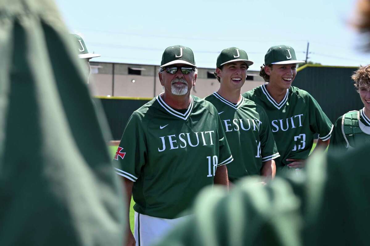 Strake Jesuit head coach Raul Garcia-Rameau addresses his team after their 2-1 win of Game 3 of a Region III-6A semifinal high school baseball playoff series against the Katy Tigers at Jersey Village High School, Saturday, May 28, 2022, in Jersey Village.