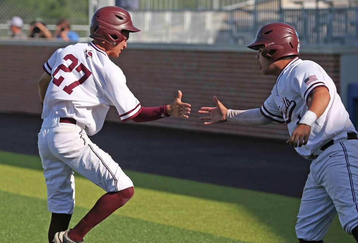Corpus Christi Calallen’s Nate Lopez (27) celebrates after scoring in Game 2. Boerne defeated Calallen 3-2 in eight innings in a regional semifinal on Saturday, May 28, 2022 at North East Sports Park.