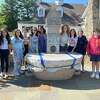 Roton Middle Schools students gather around the Nathan Hale Memorial Fountain at Fodor Farm, an extra credit stop for their social studies project, on Wednesday, May 25. From left, Abby Fry, Maddy Blair, Mackenzie McGonigle, Anora Voss, Melanie Jackson, Johanna Entzminger, Phoebe Strickland, Claire George, Bella Calise, Joe Calise and David Smith.