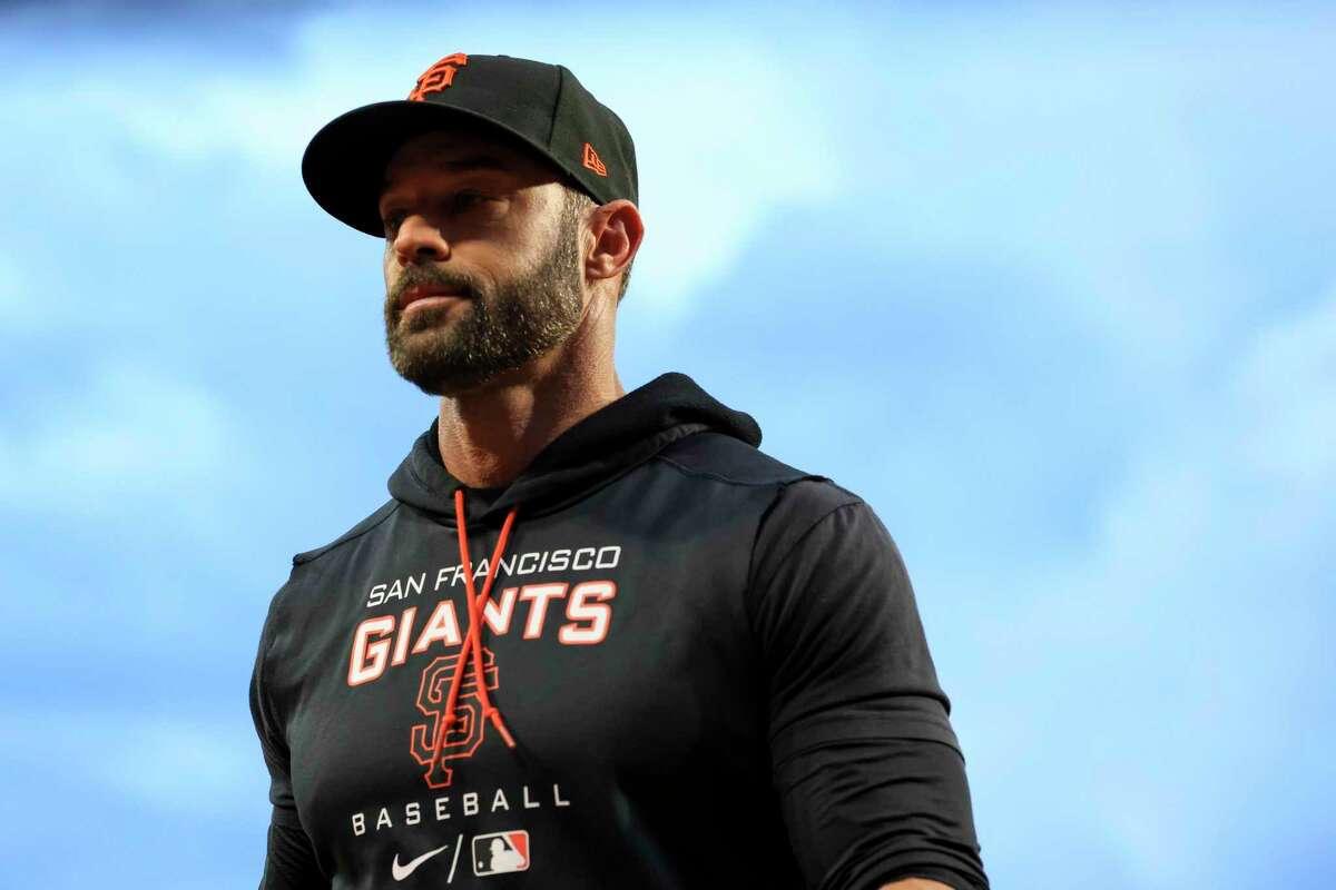 Giants manager Gabe Kapler was not on the field for the national anthem during the series in Cincinnati, but he said he is open to changing his stance for the game on Memorial Day.