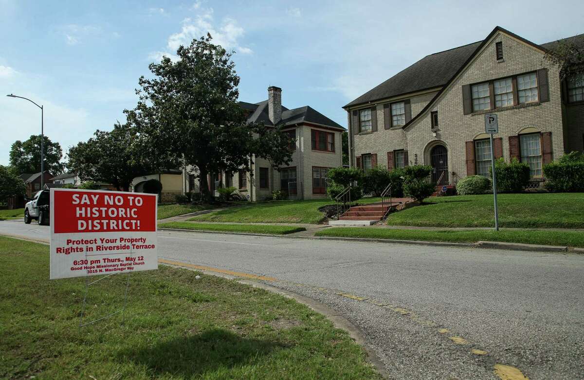 A sign in opposition of Riverside Terrace Historic District can be seen near Southmore Boulevard and Burkett Street on Friday, May 13, 2022, in Third Ward. Mayor Sylvester Turner announced Wednesday that his administration was withdrawing the proposal for the historic district in light of neighborhood opposition.