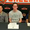 Giovanna Gonzalez, Billy McGuire, Roy Lenhard, Mia Ferreira and Adrianna Franzese signed to play sports in college at a ceremony at Shelton High.