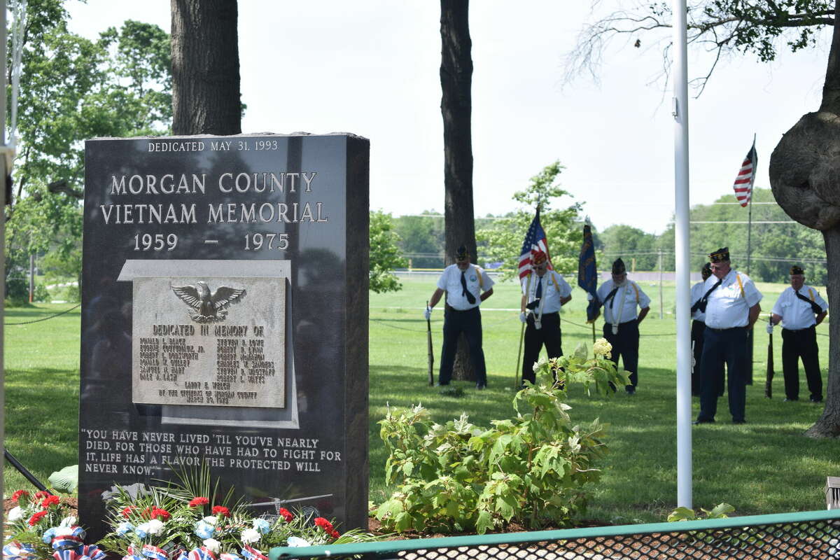 Jacksonville residents and Gold Star Family members attend a re-dedication of the Vietnam Memorial in Nichols Park. The Memorial Day ceremony honored the 13 Morgan County men who died while serving in the war.