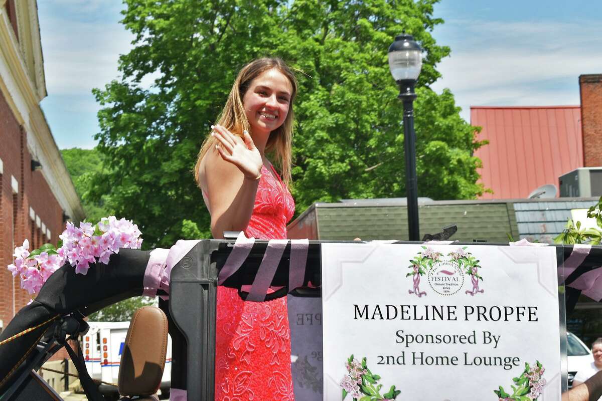 Winsted celebrated Memorial Day with a combined parade that included Laurel King and Queen candidates and participants in the Rotary Pet Parade, which was canceled May 21 because of the heat. Madeline Propfe, a 2022 Laurel Queen candidate, waves at the crowd.