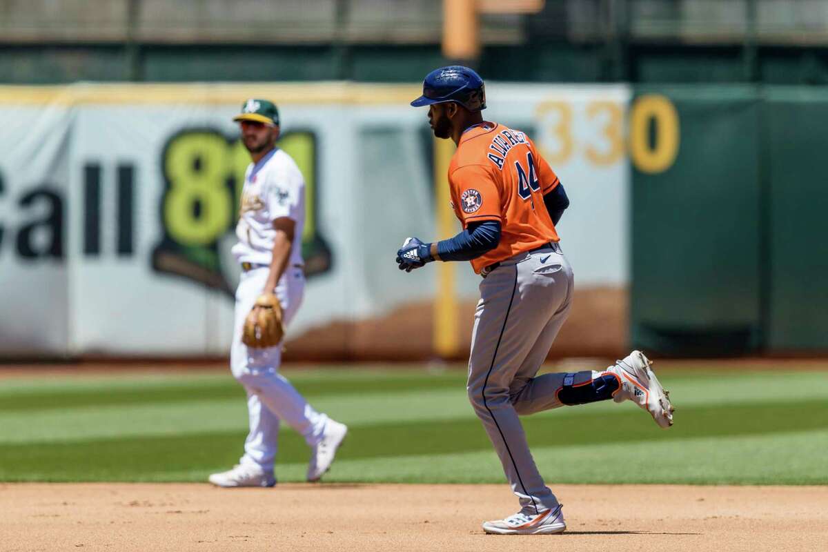 Houston Astros' Yordan Alvarez runs the bases after hitting a solo home run against the Oakland Athletics during the fourth inning of a baseball game in Oakland, Calif., Monday, May 30, 2022. (AP Photo/John Hefti)
