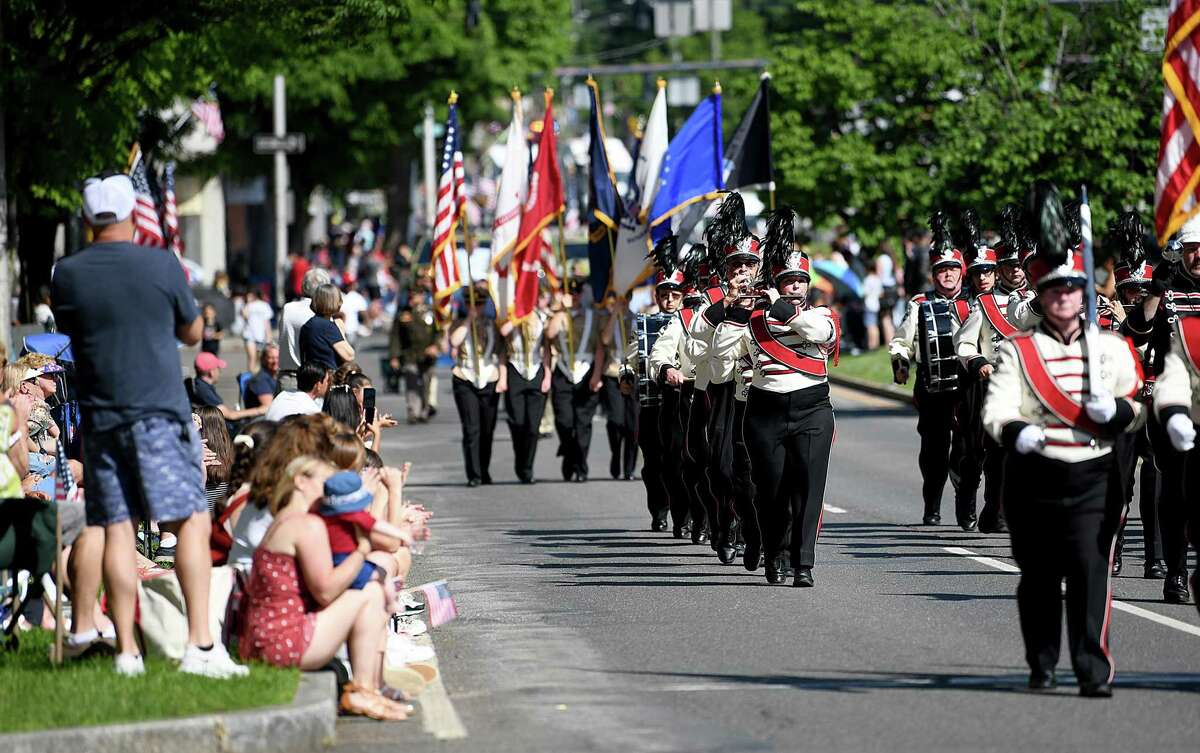 The Danbury Drum Corp makes it's way down Main Street at the start of Danbury's Memorial Day Parade, Monday, May 30, 2022. It was the first parade held since 2019 due to Covid.