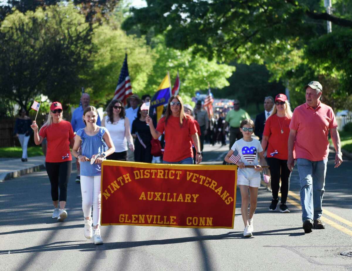The Ninth District Veterans Auxiliary marches in the Memorial Day Parade in the Glenville section of Greenwich, Conn. Sunday, May 29, 2022. Presented by the 9th District Veterans Association and the Glenville Volunteer Fire Company, the parade and ceremony honored the veterans' lives lost in battle.