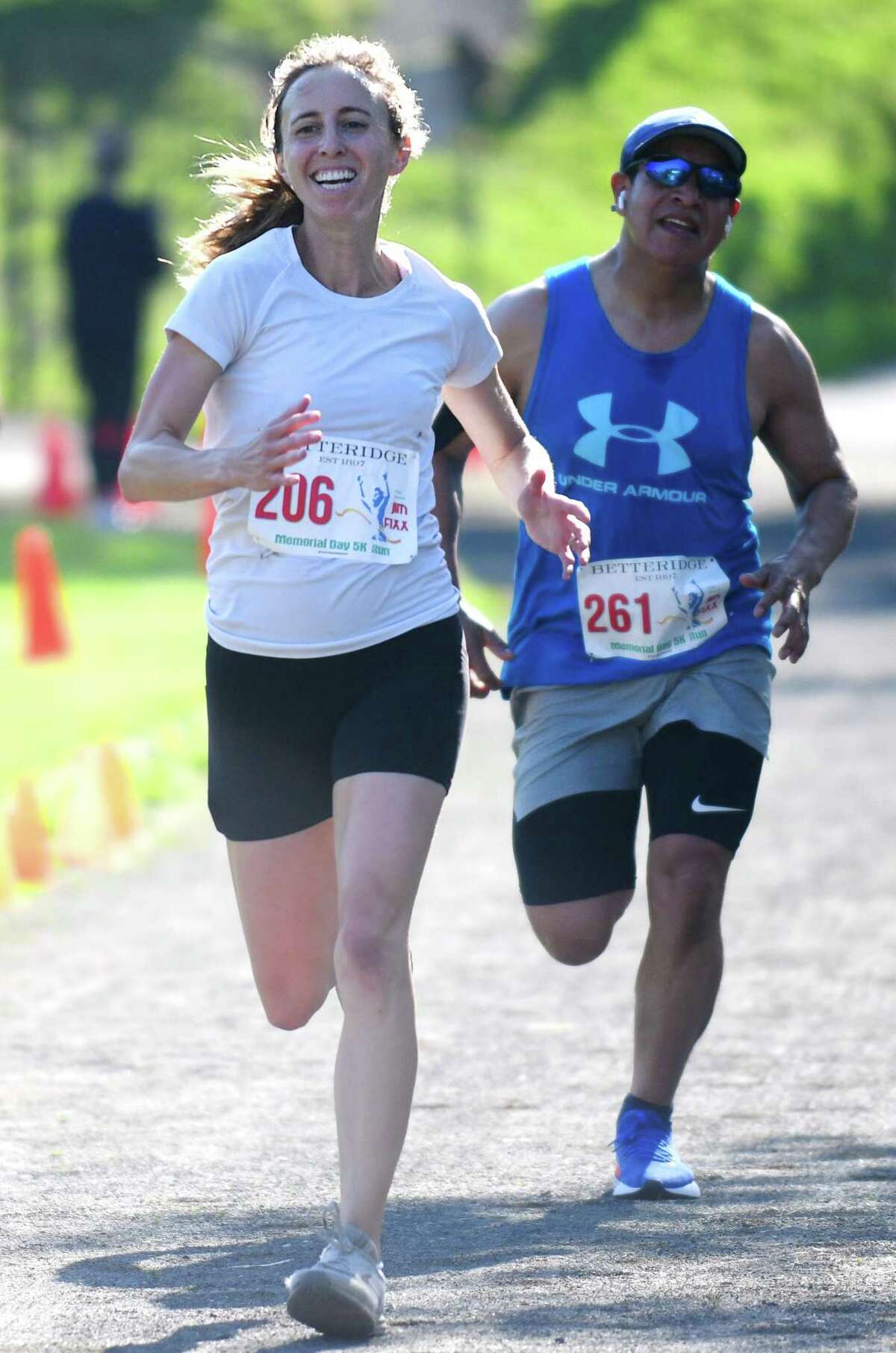 Greenwich's Kelly Annunziato finishes first place among women with a time of 21:25 in the Jim Fixx Memorial Day 5K Run in Greenwich, Conn. Monday, May 30, 2022. More than 200 runners competed in the 5K with Cos Cob's Asher Beck finishing first overall and Greenwich's Kelly Annunziato finishing first among women.