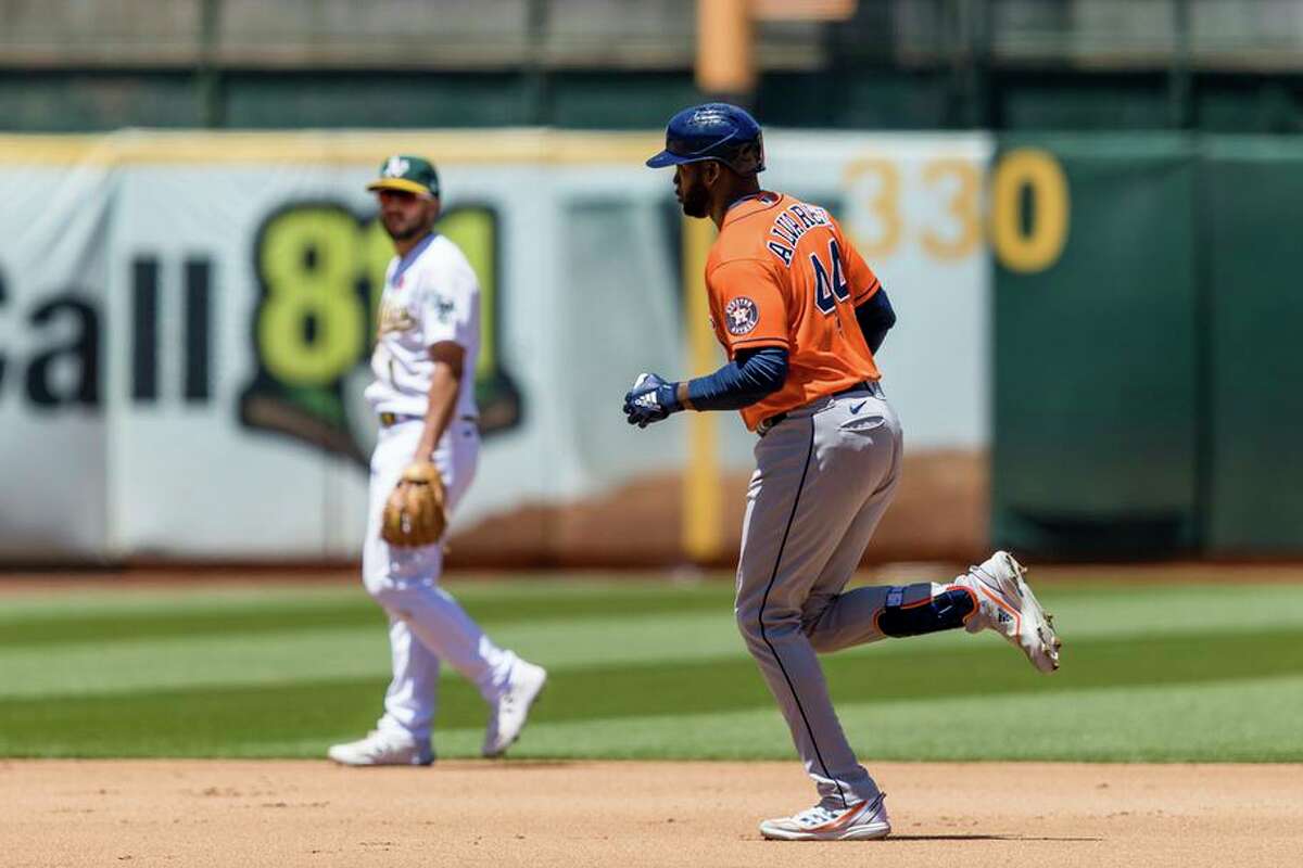Houston Astros' Yordan Alvarez runs the bases after hitting a solo home run against the Oakland Athletics during the fourth inning of a baseball game in Oakland on Monday.