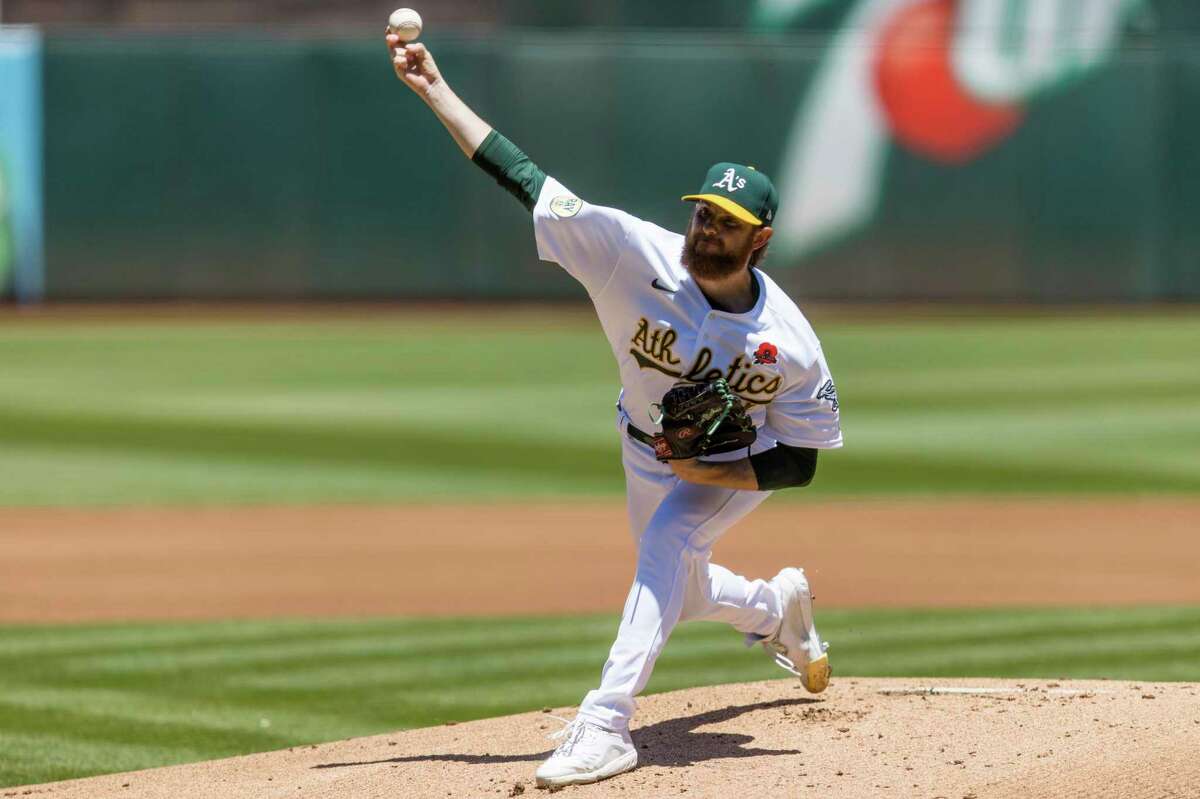 Oakland Athletics' Paul Blackburn pitches against a Houston Astros batter during the first inning of a baseball game in Oakland, Calif., Monday, May 30, 2022. (AP Photo/John Hefti)