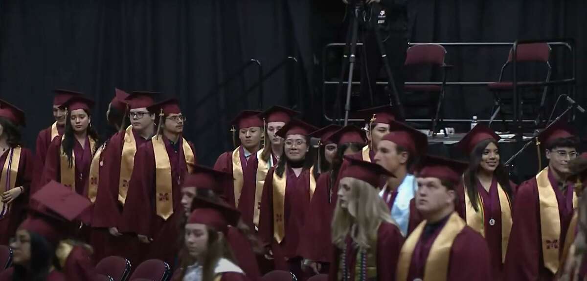 Magnolia ISD seniors walk the stage during graduations at Reed Arena