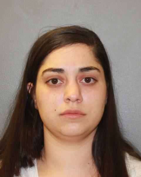 Police: Woman found with gun, heroin outside Hamden apartments