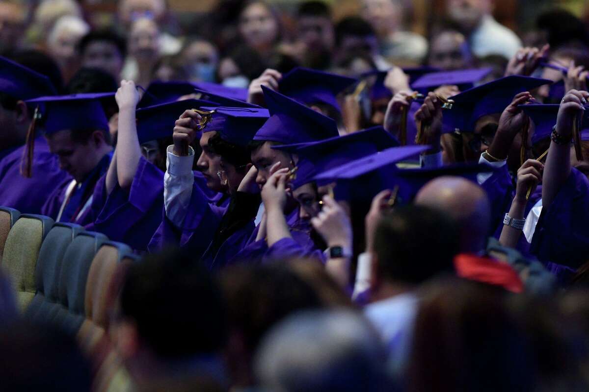 Tomball Star Academy graduates turn the tassel during their ceremony on May 26 at Champion Forest Baptist Church.