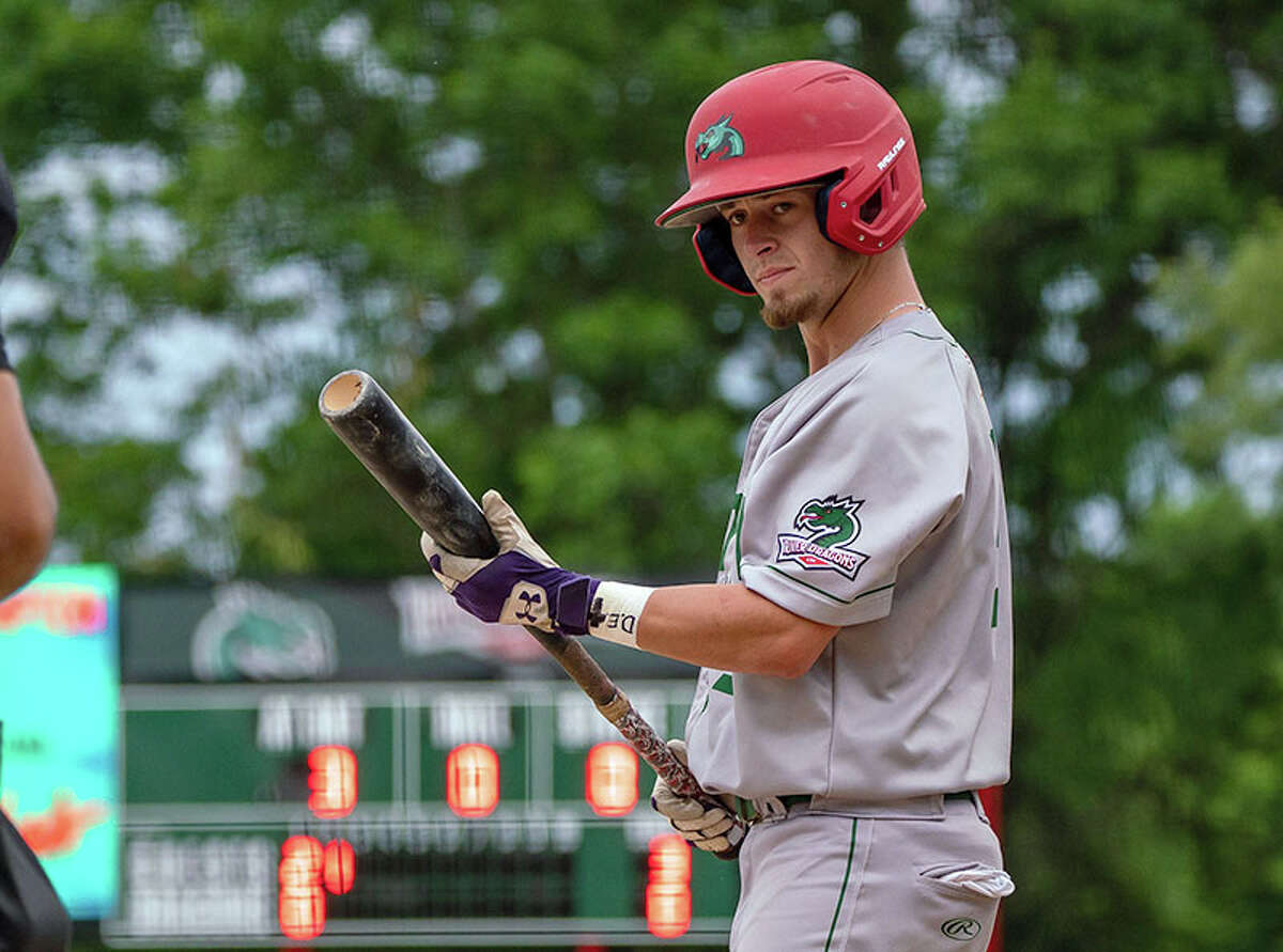 Mike Hampton of the Alton River Dragons eyes up the opposing pitcher from the on deck circle during a game last season at Hopkins Field. Hampton will be among the River Dragons at Wednesday's season opener against Springfield.