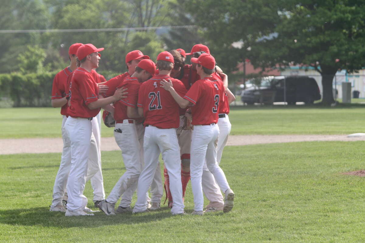 The Lakers celebrate a 6-3 victory over Frankfort on Tuesday. 