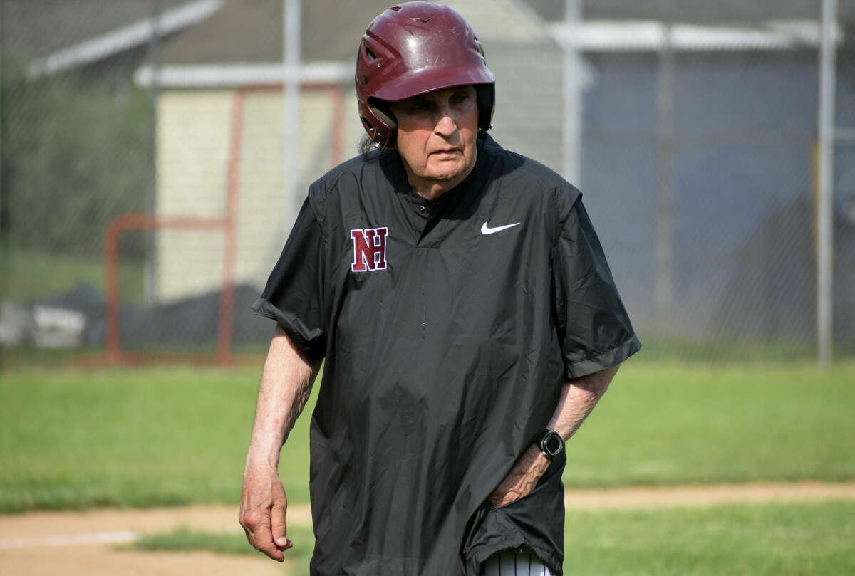 North Haven coach Bob DeMayo walks off the field during the Class L baseball tournament first round between Lyman Hall and North Haven at Pat Wall Field, Wallingford on Tuesday, May 31, 2022.