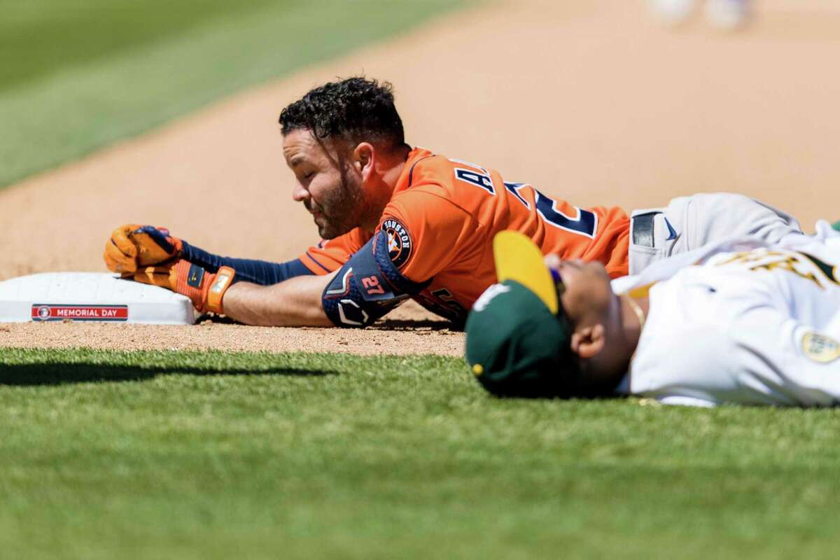 The Astros’ Jose Altuve isn’t one to lie down on the job, but it was unavoidable Monday after he collided with A’s first baseman Christian Bethancourt.