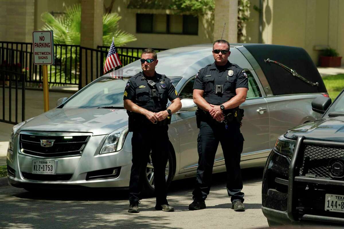 Police stand guard during the funeral service for Amerie Jo Garza at Sacred Heart Catholic Church, Tuesday, May 31, 2022, in Uvalde, Texas. Garza was killed in last week's elementary school shooting, (AP Photo/Eric Gay)