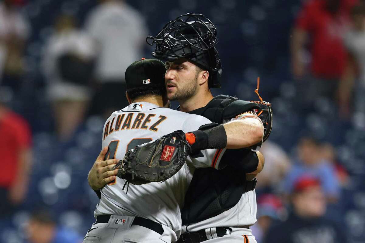 PHILADELPHIA, PA - MAY 31: Closer Jose Alvarez #48 and catcher Joey Bart #21 of the San Francisco Giants embrace after defeating the Philadelphia Phillies 7-4 in 11 innings at Citizens Bank Park on May 31, 2022 in Philadelphia, Pennsylvania. (Photo by Rich Schultz/Getty Images)