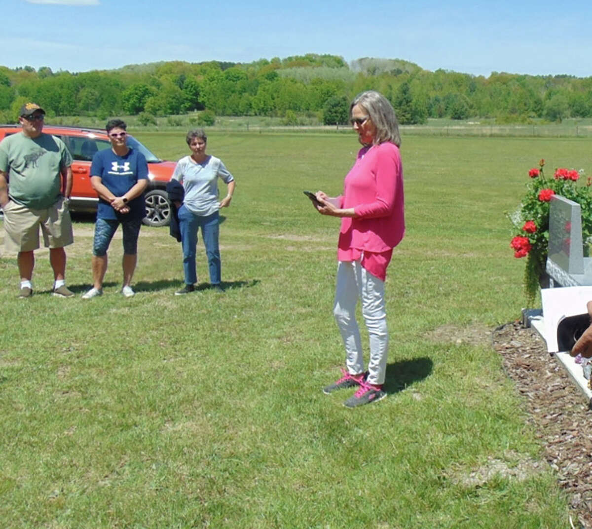 Friends and loved ones gathered in support for Victoria Bennett as a conversation bench was dedicated in memory of her mother, Diane Chorba, who disappeared and was murdered near Luther in 1979. Cindy Holmes, of Luther, was one of the people who offered a few words for the service. 