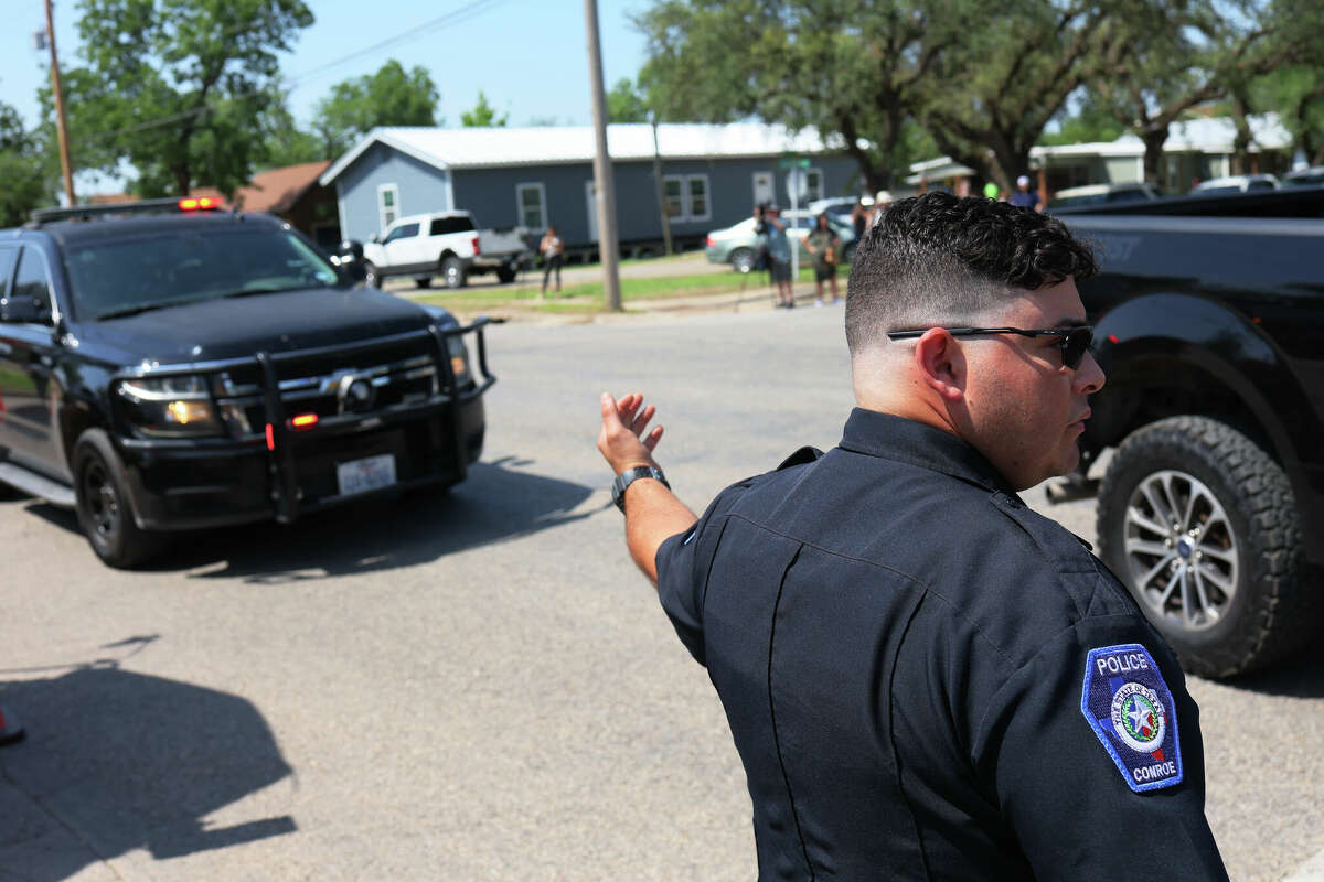 UVALDE, TEXAS - MAY 29: Law enforcement officials prepare for the arrival of President Joe Biden's attendance for mass at Sacred Heart Catholic Church on May 29, 2022 in Uvalde, Texas. On May 24th, 19 children and two adults were killed during a mass shooting at Robb Elementary School after a gunman entered the school through an unlocked door and barricaded himself in a classroom where the victims were located. (Photo by Michael M. Santiago/Getty Images)