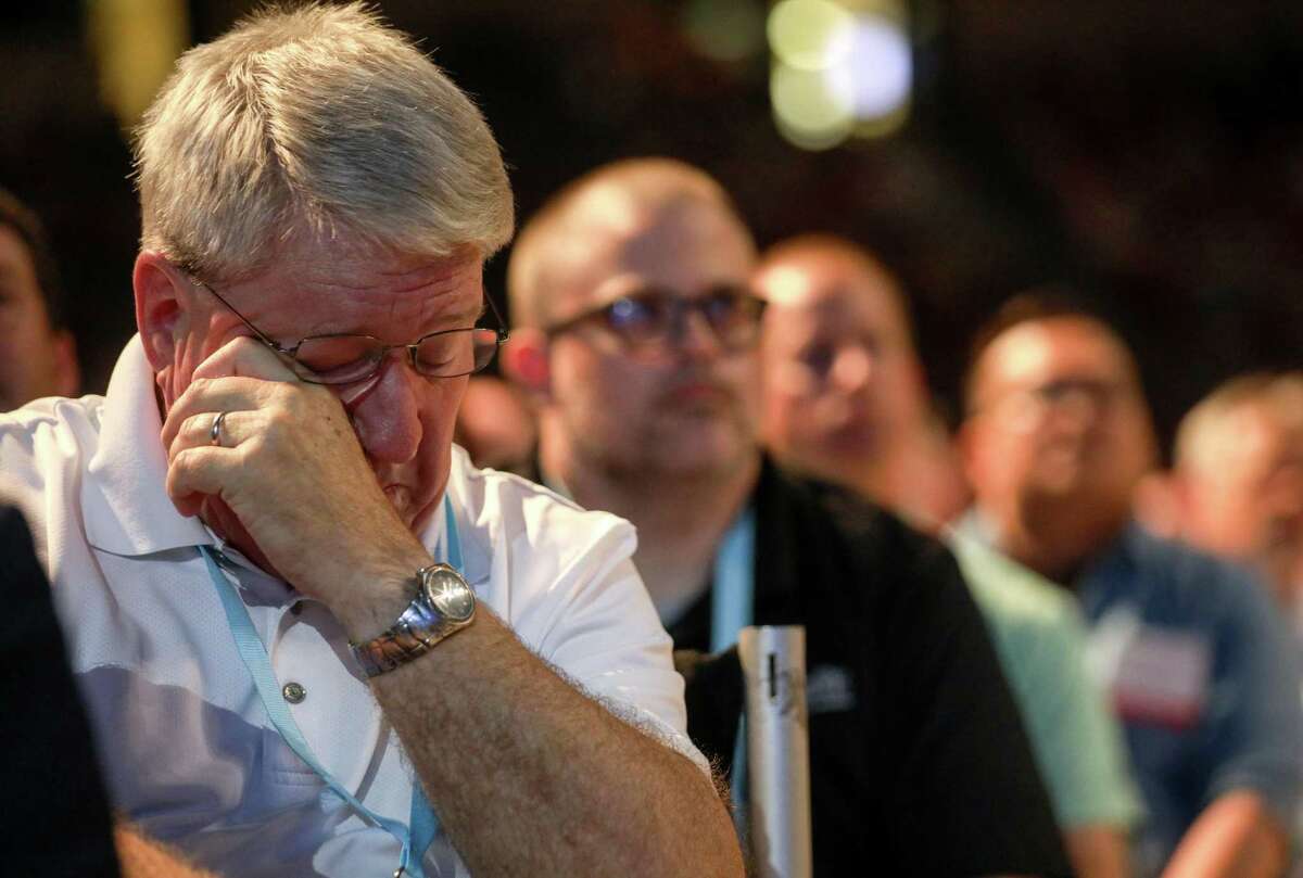 Lynn Greear, father of Southern Baptist Convention President J.D. Greear, cries Wednesday, June 12, 2019, while listening to his son talk about sexual abuse within the SBC during the SBC’s annual meeting in Birmingham.