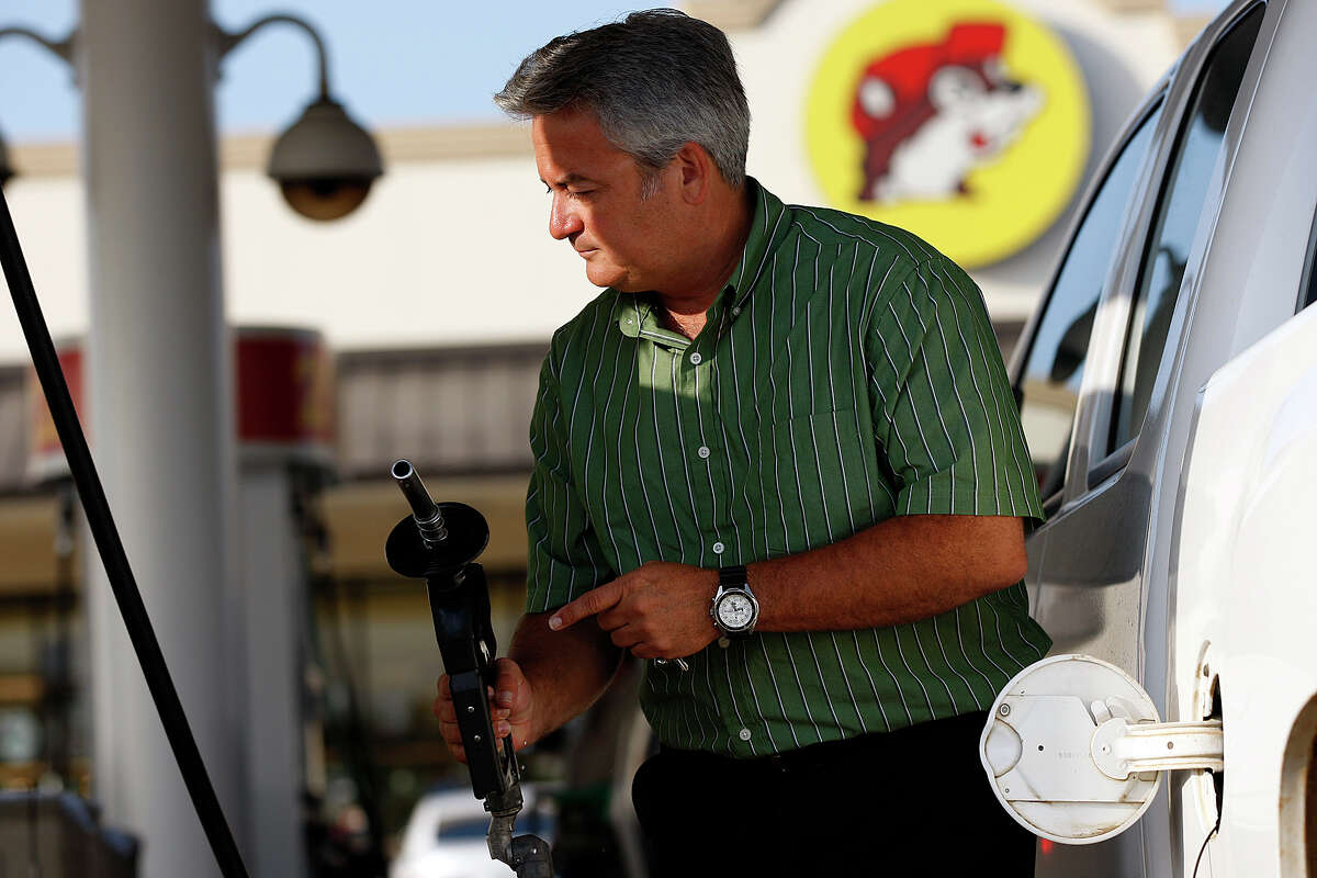 Gordon Spradley, of Houston, gasses up at Buc-ees, on IH-10 east of Luling, Texas, Tuesday, August 24, 2010. 