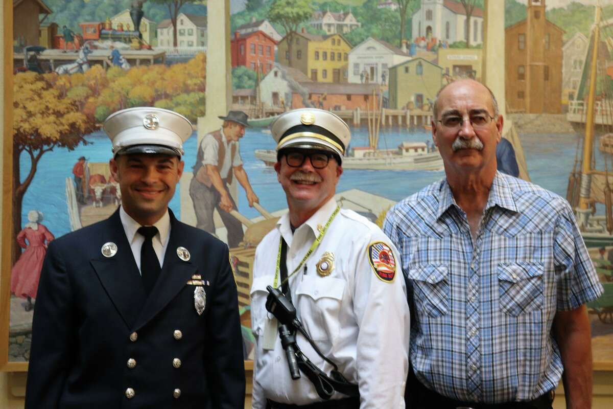 Newly appointed Westport Fire Marshal Terry Dunn alongside retiring Fire Marshal Nate Gibbons and retired Fire Marshal Ed Zygmant.