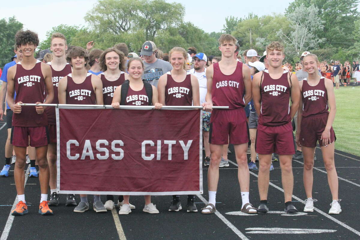 The Cass City track team marches at the Thumb Meet of Champs' Parade of Athletes.