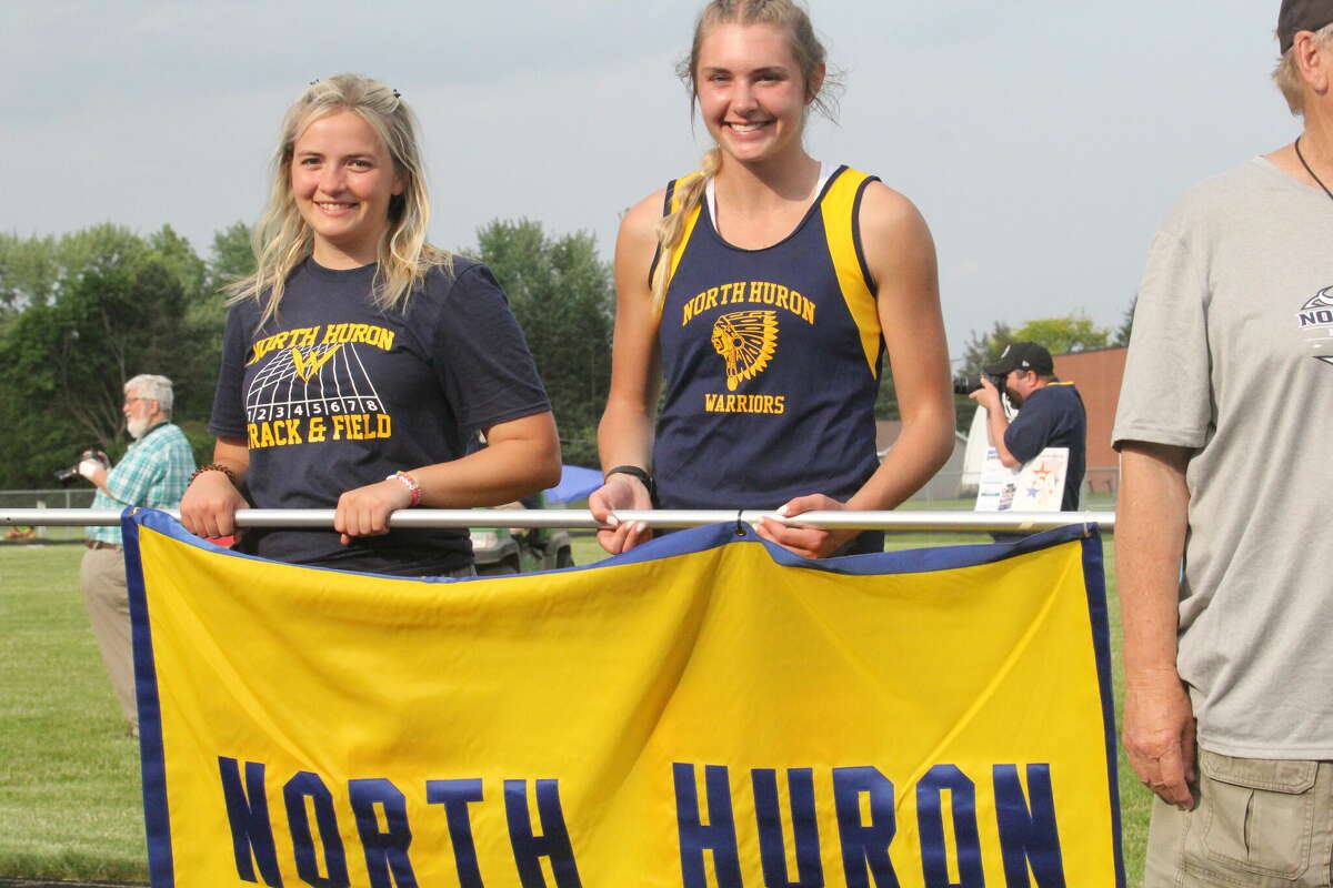 The North Huron track team marches at the Thumb Meet of Champs' Parade of Athletes.