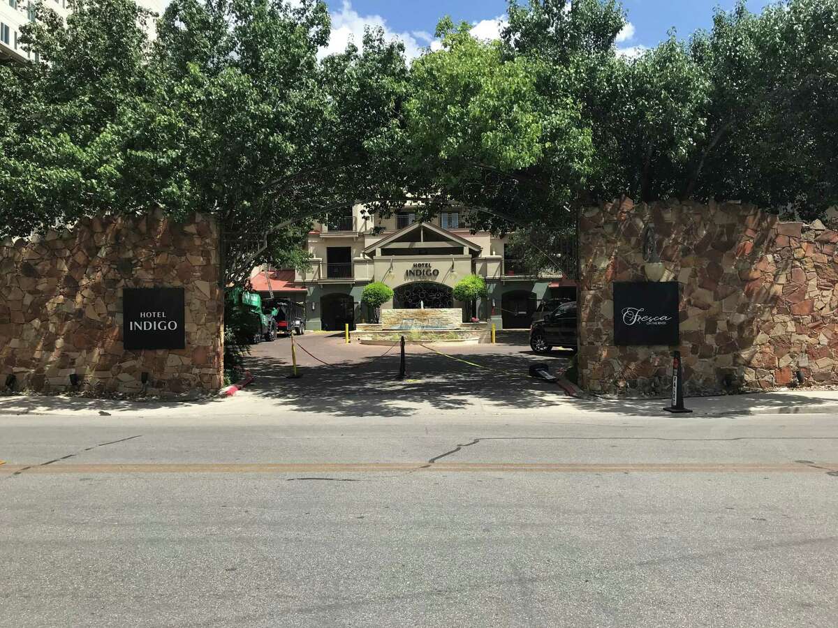 The Hotel Indigo says it has lost $130,000 in revenue from rooms it had to close because of smoke and odors emanating from the Thompson San Antonio - Riverwalk next door.