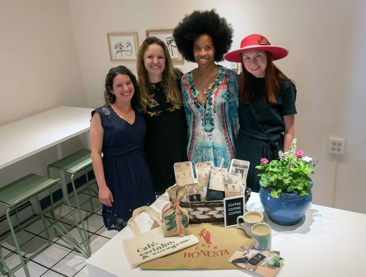 Honesta co-owners, from left, Lauren Neulander, Erin Maciel, Camille Daniels and Kathleen Willcox stand behind their coffee products at Palette on Monday, May 30, 2022 in Saratoga Springs, N.Y. Honesta locally roasts and sells coffee beans from single-origin female bean farmers in Brazil.