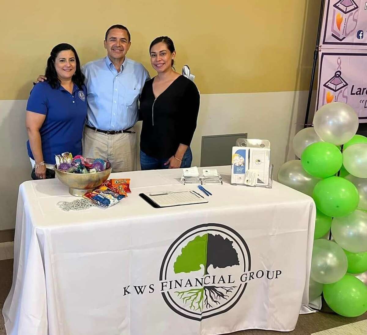 Liz Martinez (right side in black) with Congressman Cuellar and another member of the KWS Financial Group. Images from the "Women's Health & Wellness Expo" held on evening Tuesday May 31, 2022 as part of the International Day for Women's Health. Women shopped around as they look for what services and resources are offered in the community. 