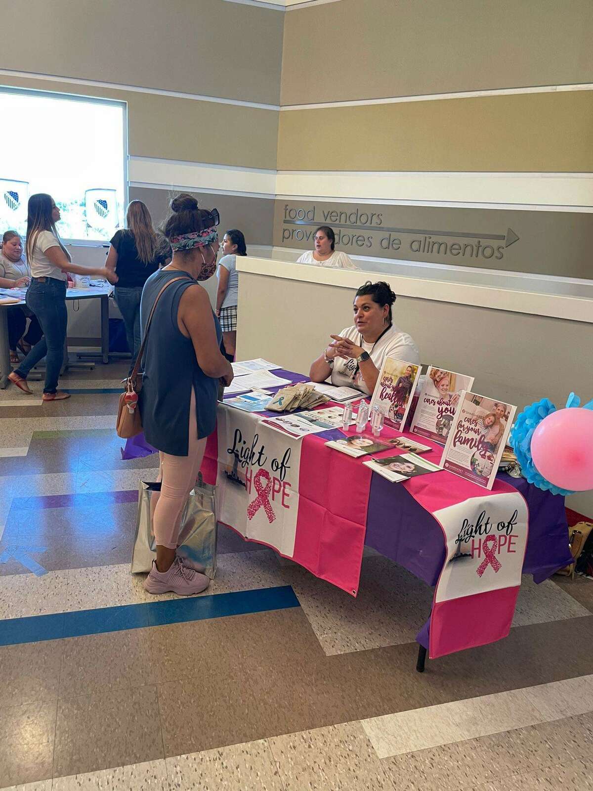 Images from the "Women's Health & Wellness Expo" held on evening Tuesday May 31, 2022 as part of the International Day for Women's Health. Women shopped around as they look for what services and resources are offered in the community. 