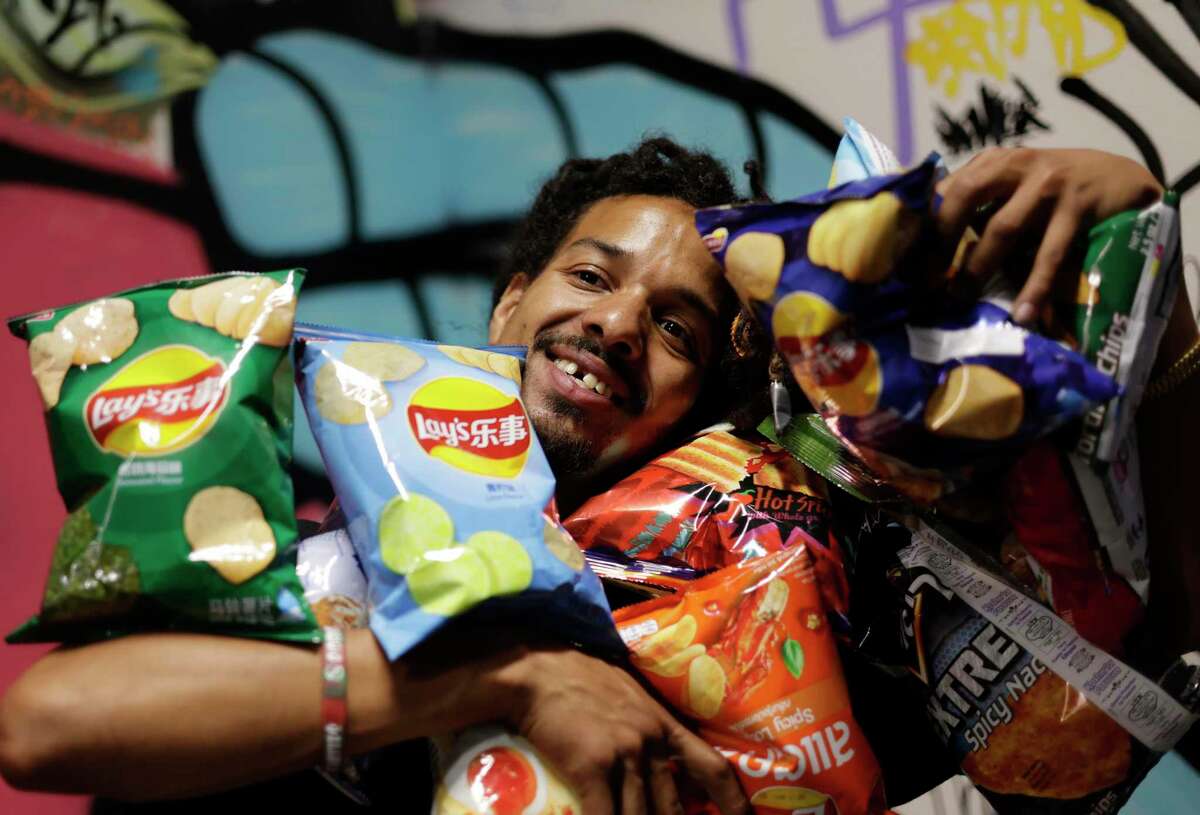 San Jose rapper Yonex Jones sells lots of chips from China, Thailand and India at his store TankShop.
