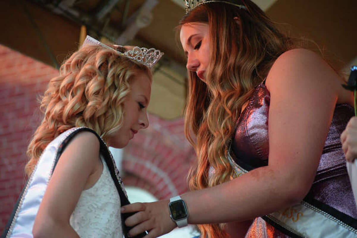 Chelsea Bell (right), the 2019 Junior Miss Virginia Bar-B-Que, crowns the 2021 Junior Miss Virginia Bar-B-Que Jersey Henson in 2021. The barbecue is just one of a number of summer events taking place this weekend across the region.