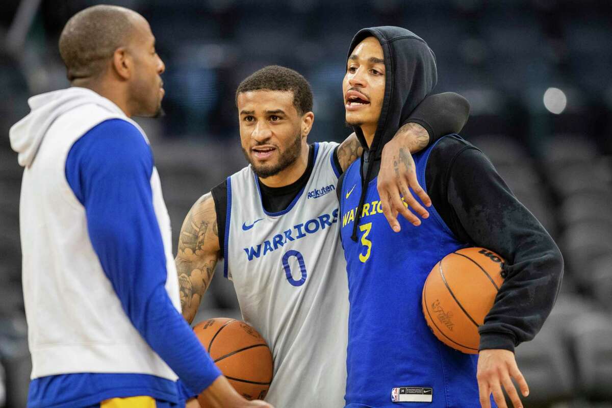 (L-R) Golden State Warriors' forward Andre Iguodala, guard Gary Payton II and guard Jordan Poole are seen during NBA Finals Practice and Media Availability at Chase Center in San Francisco, Calif. Wednesday, June 1, 2022.