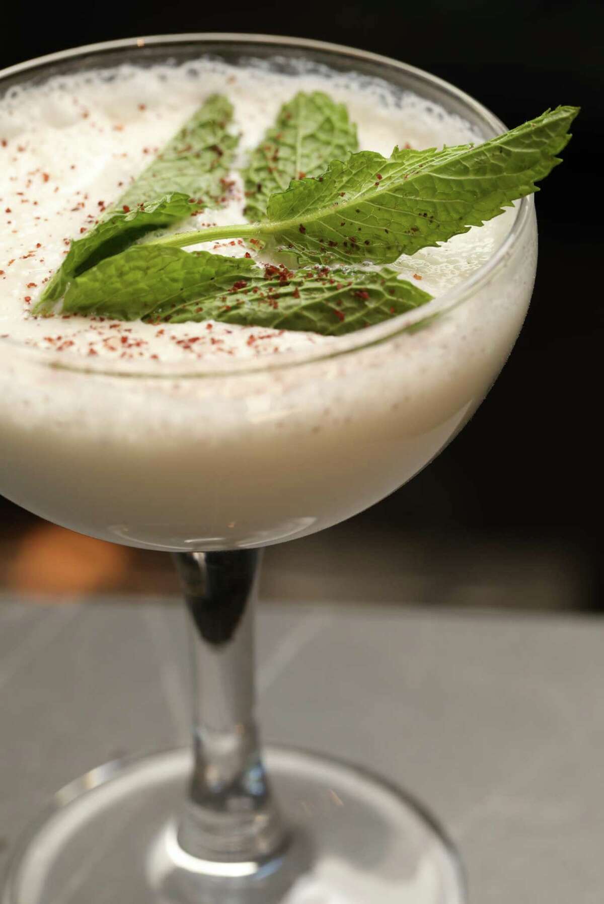 The Spice Merchant drink (vodka, sumac yogurt, lime juice, mint syrup) is part of Kitchen Door’s new cocktail program.