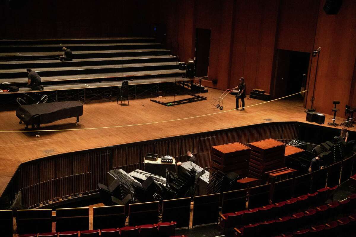 The Jesse H. Jones Hall orchestra pit gets lowered, Tuesday, May 31, 2022, in Houston, with gear on it that will be transported and stored as the performing hall is renovated.
