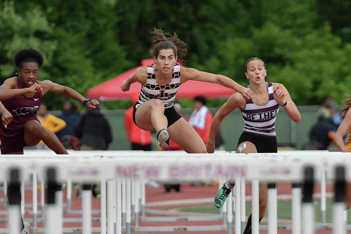 Barlow’s Mariella Schweitzer wins the 100 meter hurdles during the Class MM championship on Wednesday.