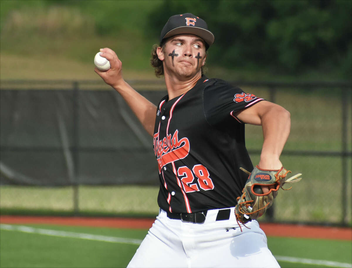 Edwardsville's Spencer Stearns makes a pitch against Belleville East in the Class 4A Illinois Wesleyan Sectional semifinals at Roy E. Lee Field in Edwardsville.