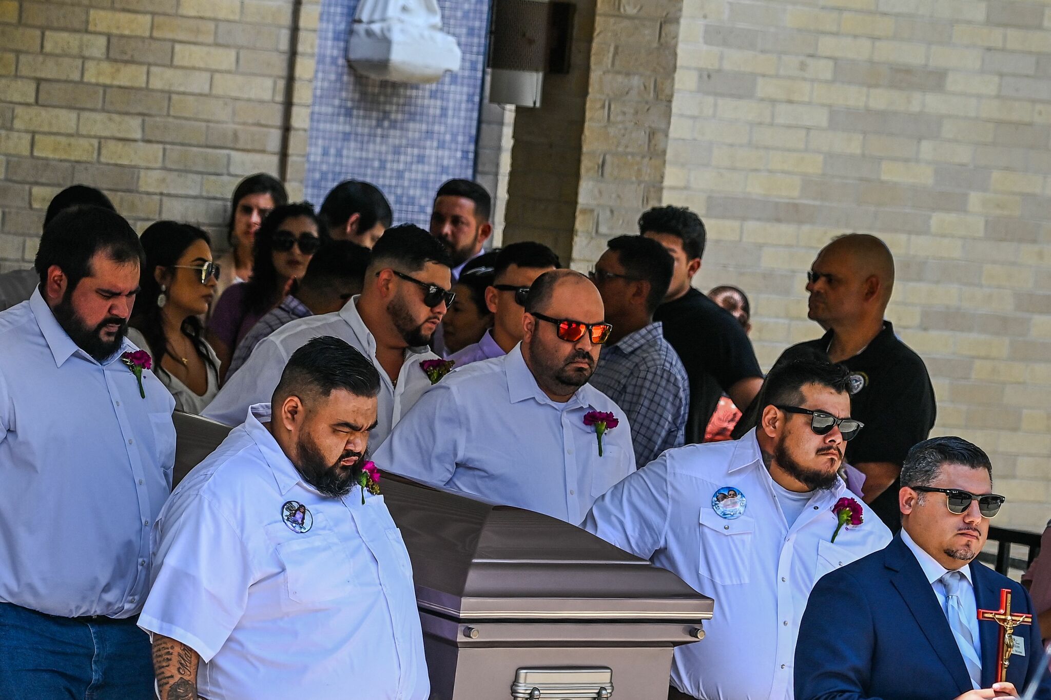Artists decorating caskets for Uvalde, Texas school shooting victims