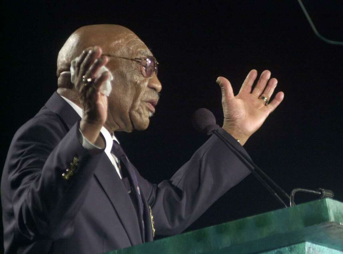 Charlie Sifford gives an acceptance speech during his induction into the World Golf Hall of Fame Monday, Nov. 15, 2004, in St. Augustine, Fla. Sifford fought the PGA Tour over its Caucasian-only clause until he became its first black member in 1960.(AP Photo/Oscar Sosa)