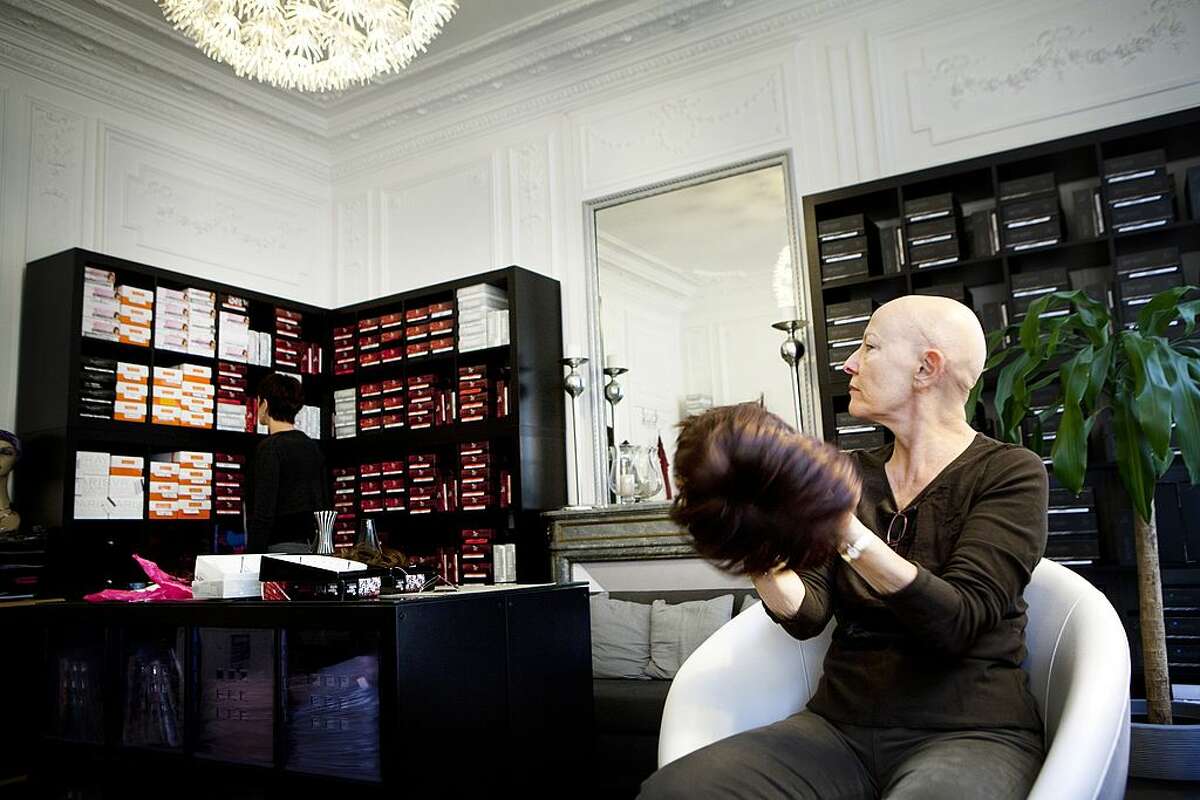 Psychologist and wigmaker Paris treats cancer patients after chemotherapy and provides women with aesthetic solutions during treatment. This woman is suffering from alopecia for 10 years.