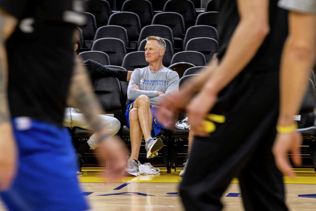 Golden State Warriors coach Steve Kerr watches the basketball team's practice Wednesday, June 1, 2022, in San Francisco. The Warriors and the Boston Celtics are scheduled to play Game 1 of the NBA Finals on Thursday. (Stephen Lam/San Francisco Chronicle via AP)