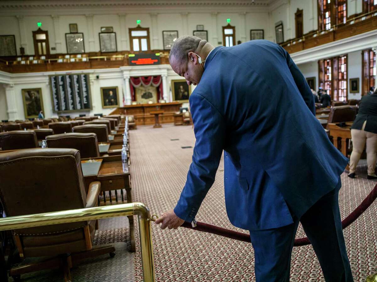 Doorkeeper to the Texas House of Representatives Anthony Hester cordons off the Texas House Floor after the second special session called by Governor Greg Abbott was quickly adjourned due to a lack of a quorum on Saturday, August 7, 2021 in Austin, Tx., U.S. The Texas House of Representatives did not have a quorum due to a number of Texas House Democrats being absent and adjourned quickly after opening the session on Saturday afternoon.