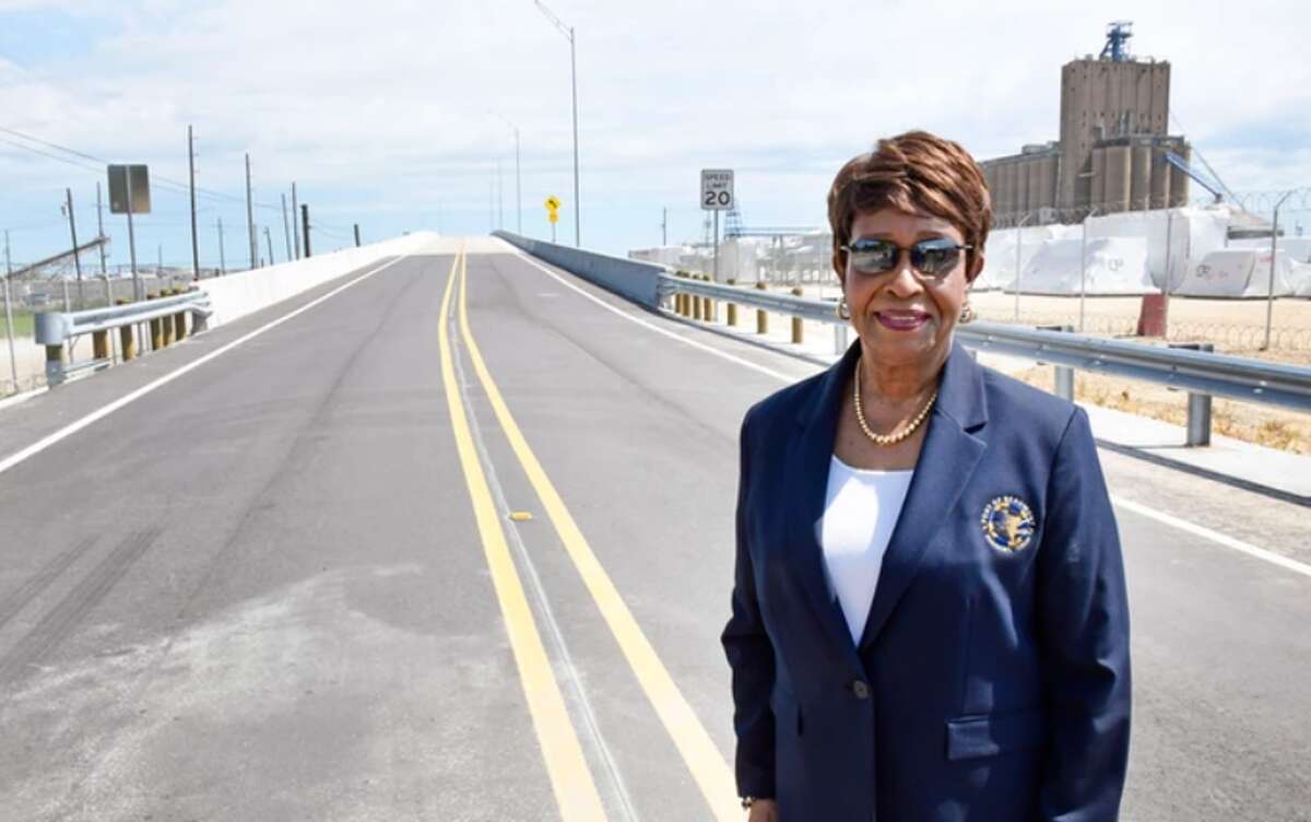LaRue Smith stands next to the recently-completed Lee E. Smith Overpass, May 26, 2022, dedicated for her husband who served on the Port of Beaumont's board of commissioners for almost 20 years.